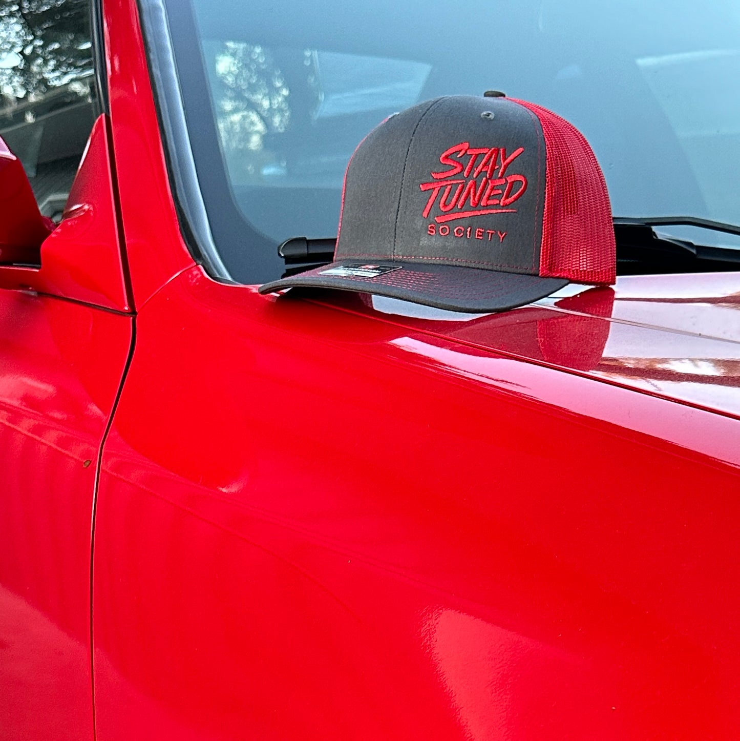 Stay Tuned Society Trucker Hat – V1