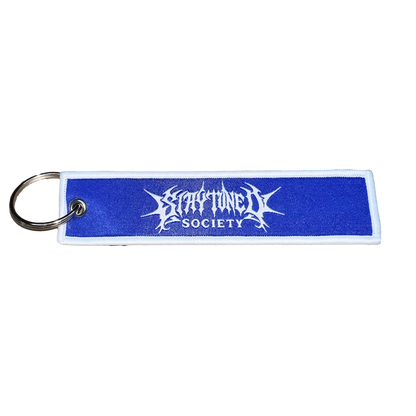 StayTuned Woven Jet Tag Keychain – Premium Woven Logo + Embroidered Edge