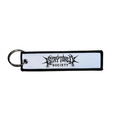 StayTuned Woven Jet Tag Keychain – Premium Woven Logo + Embroidered Edge